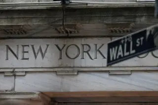 Wall Street closes volatile week with gains as earnings season looms
