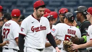 Tense bunt ends Gavin Williams' perfect game bid as benches clear