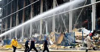 Cleanup under way as Boyle Heights warehouse fire leaves rotting food and stench