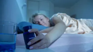 Melatonin's regulatory crossroads: drug status vs. sleep supplement