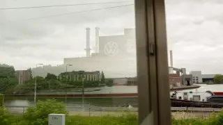 German auto giants purge managers as they trim white-collar headcount