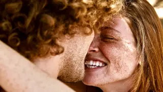 Ancient DNA uncovers ongoing human evolution: lighter skin, red hair, and reduced baldness in West Eurasia