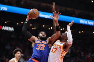 Knicks ride record halftime surge to playoff-clinching win over Hawks