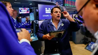 Fed Hike Triggers Dollar Strength and Global Market Ripples