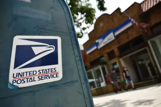 USPS rule to curb mail-in voting triggers union backlash and lawsuits