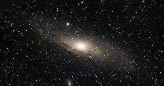 Ancient Interstellar Visitor 3I/ATLAS Carries CO2-Rich Coma Through Our Solar System