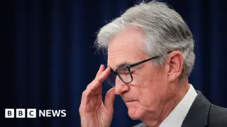 Fed holds rates as Powell's chair tenure nears end, Warsh confirmation looms