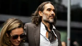 Judge dismisses one charge against Russell Brand as trial hears his defense of 'promiscuous' past