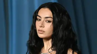 Charli XCX stuns in black mini at LA pop-up for Music, Fashion, Film