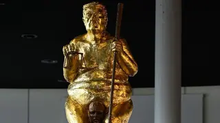 Satirical Gold Statue of Trump Debuts in European Parliament