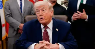 Trump Dismisses Female Reporter With Hand Gesture Over Iran Question