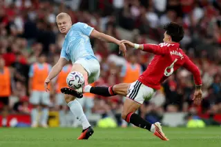 Haaland seals City win as United go down to 10