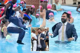 Suit-Clad NYC Mayor Splashes Into Pool to Open Summer