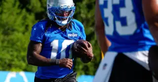 Lions move Pacheco to IR, bring Lovett to practice squad as Conklin returns