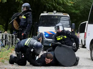 The Hague erupts as riot police break up far-right anti-immigration protest