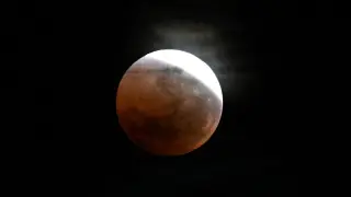 Nearly Full Shadow: 96% Partial Lunar Eclipse To Light Up August Nights