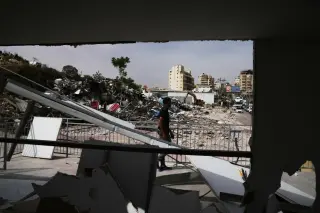 West Bank shops razed to clear land for settlements-linked road