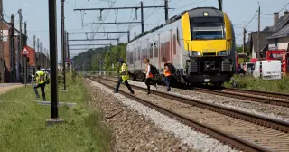 Belgian level-crossing crash claims four lives, including two pupils