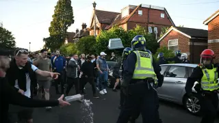 Bodycam reveals plea for air as UK stabbing spurs protests and political finger-pointing
