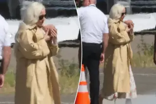Lady Gaga lands in LA cradling her baby with fiancé Polansky