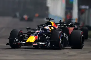 Verstappen Claims First Singapore Win as Hamilton's Strategy Backfires