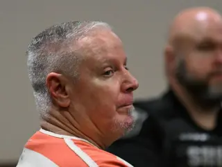 Father who supplied gun for Georgia school shooting gets 15-year sentence