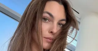 Vittoria Ceretti Stuns in Dramatic Plunging Black Dress on Instagram