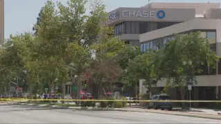 Bakersfield bank hostage crisis: police negotiate as bomb threat prompts downtown lockdown