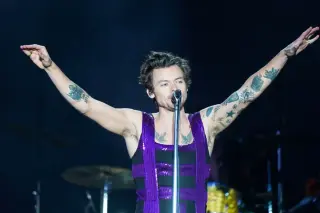 Harry Styles recovers onstage after choking on water during Wembley heatwave show