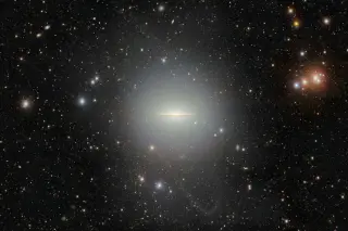 Striking Edge-On View Reveals Sombrero Galaxy in New NOIRLab Image