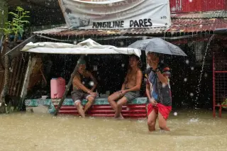 Philippines Flood Photo Gallery Highlights Storm-Driven Damage