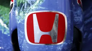 Honda's Unconventional Formula Car: Engine Beside the Driver for Handling Mastery