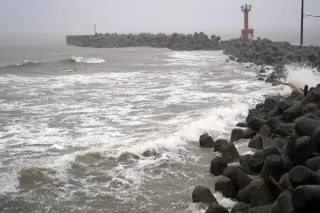 Japan battered by twin tropical storms, triggering floods, landslides and rail disruptions