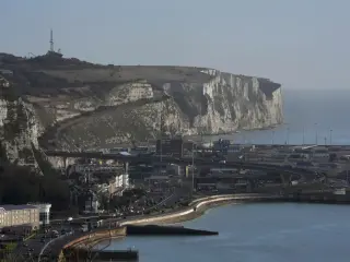 Masked Dover protest halts ferry traffic, UK condemns disruption