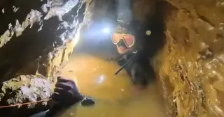 Thai cave rescuer brings hope to Laos miners rescue