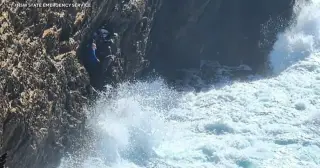 Three-hour cliff rescue on Australia’s east coast: volunteers haul seven to safety