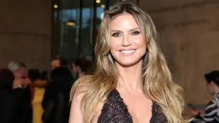 Heidi Klum Celebrates Summer Vibes with Poolside Bikini and Pup Pack