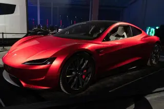 Tesla Unveils Flying Roadster at Texas SpaceX Site After Nine-Year Delay