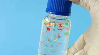 Microplastics Generate DNA-Damaging Radicals in Water, Challenging Inertness Assumptions