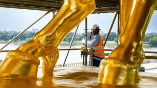 Trump unveils regilded Arts of War statues as scaffolding is removed near Lincoln Memorial