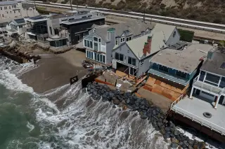 Coastline clash: California homeowners press rock walls against eroding shores
