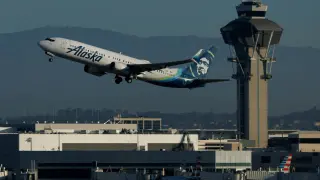 Alaska flight halted during taxi at MIA after disturbance; authorities find no credible threat