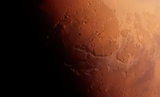 Tiny Probe Snaps Fresh Mars Crescent Ahead of Psyche Mission