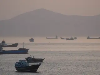 Iran vows secure Hormuz transit as US pauses operation