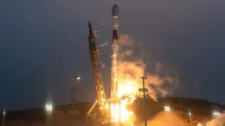 SpaceX lofts 27 Starlink satellites from California as booster lands at sea