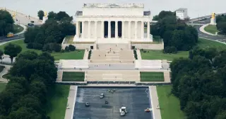 Judge permanently bars U.S. Attorney from refiling Reflecting Pool case against Olympian