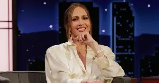JLo Stuns in a Bold Unbuttoned Silk Blouse on Jimmy Kimmel Live