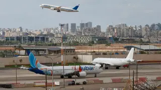 Flydubai Pilot Fight Forces Emergency Landing; Trump’s Canadian Trade Ban Takes Effect