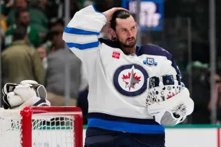 Jets suspend Hellebuyck for missing training camp, signaling crease uncertainty