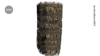 Lead ink unlocks texts from burnt Herculaneum scrolls without unrolling